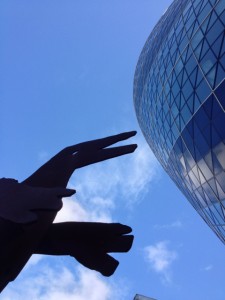 A dinosaur menaces the Gherkin in the City of London