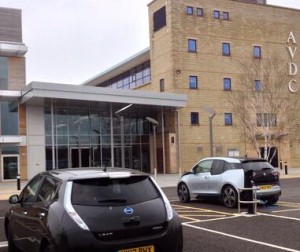 All-electric Nissan Leaf and BMW i3  recharge in AVFD car park, Aylesbury