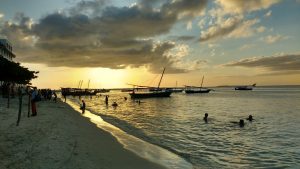 The sea at Stonetown, with the sun setting over Africa